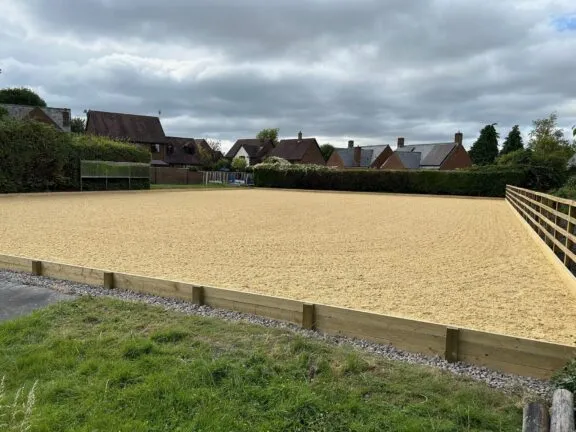 Dressage arena kickboards can be installed with our without a full height fence, depending on your preference.