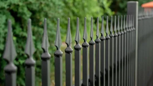 Black metal fencing rail